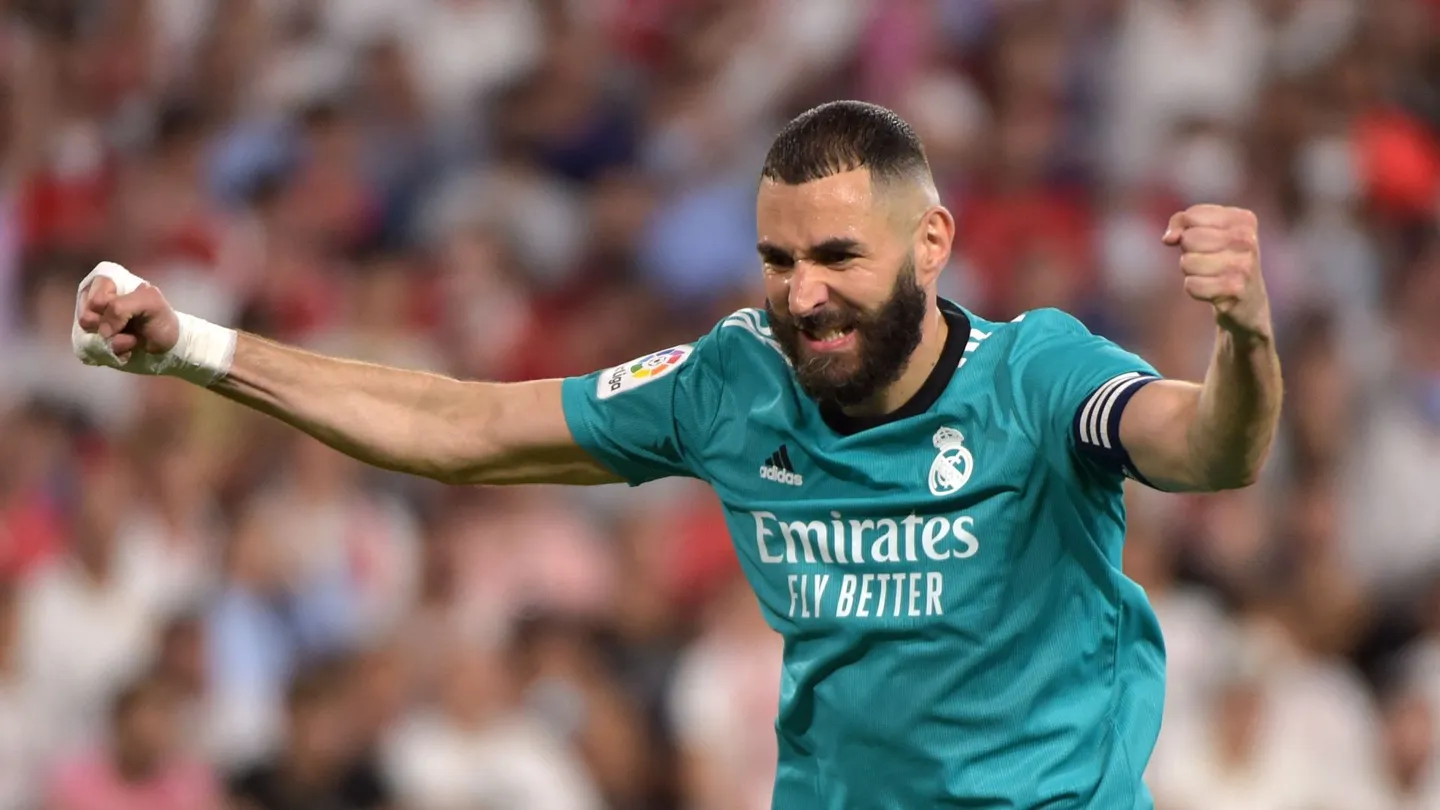 Real Madrid a step closer to winning La Liga after Benzema's late goal earns 3-2 victory at Sevilla. 46